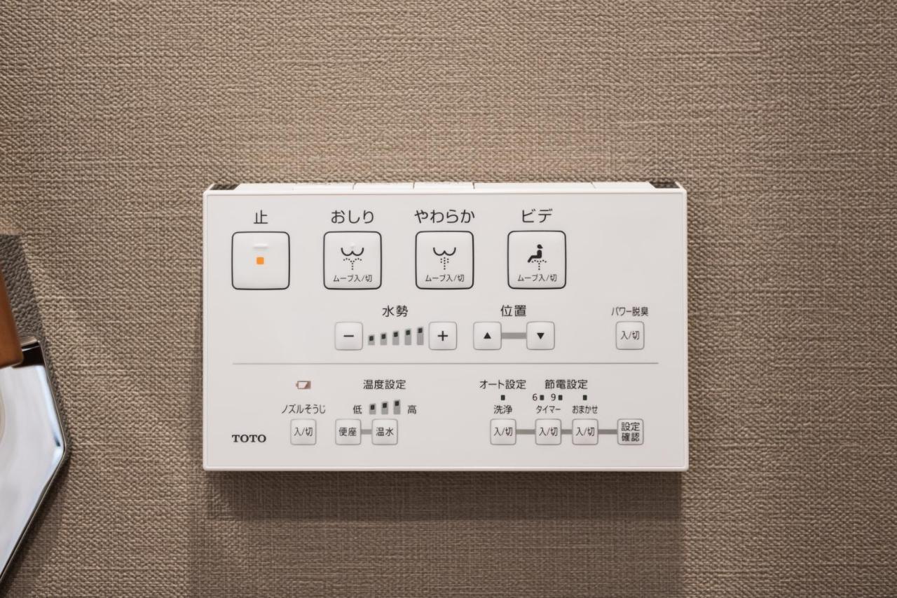 GRAND BASE Nagasaki Ekimae Aparthotel Bagian luar foto