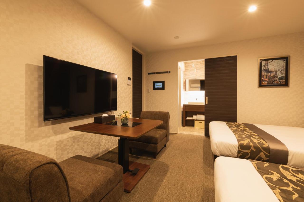 GRAND BASE Nagasaki Ekimae Aparthotel Bagian luar foto