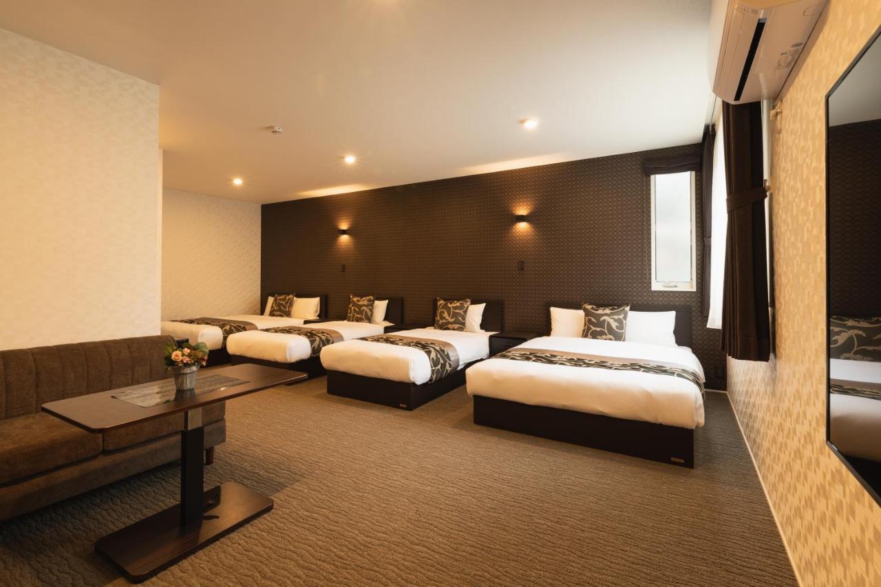 GRAND BASE Nagasaki Ekimae Aparthotel Bagian luar foto