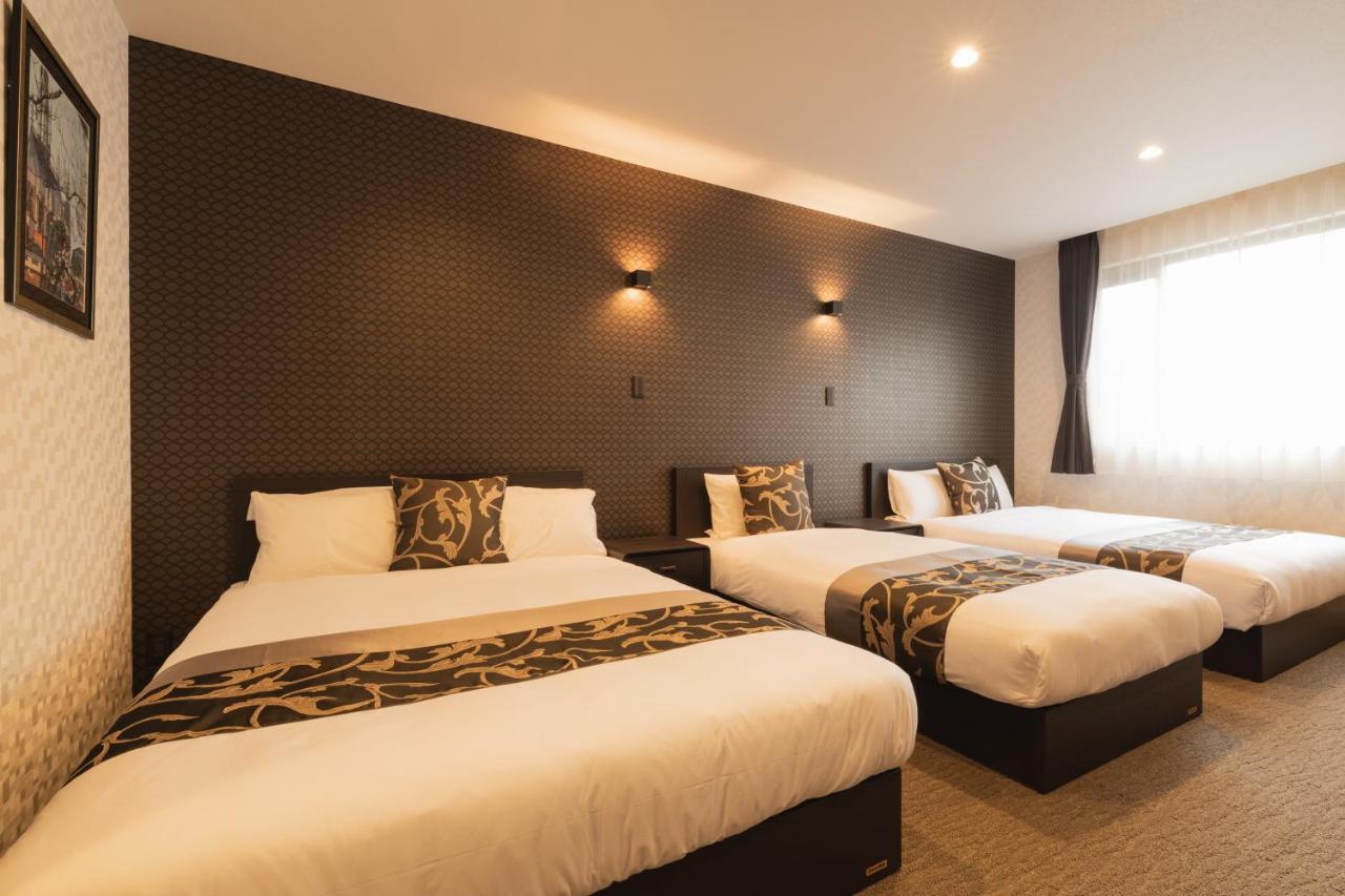GRAND BASE Nagasaki Ekimae Aparthotel Bagian luar foto